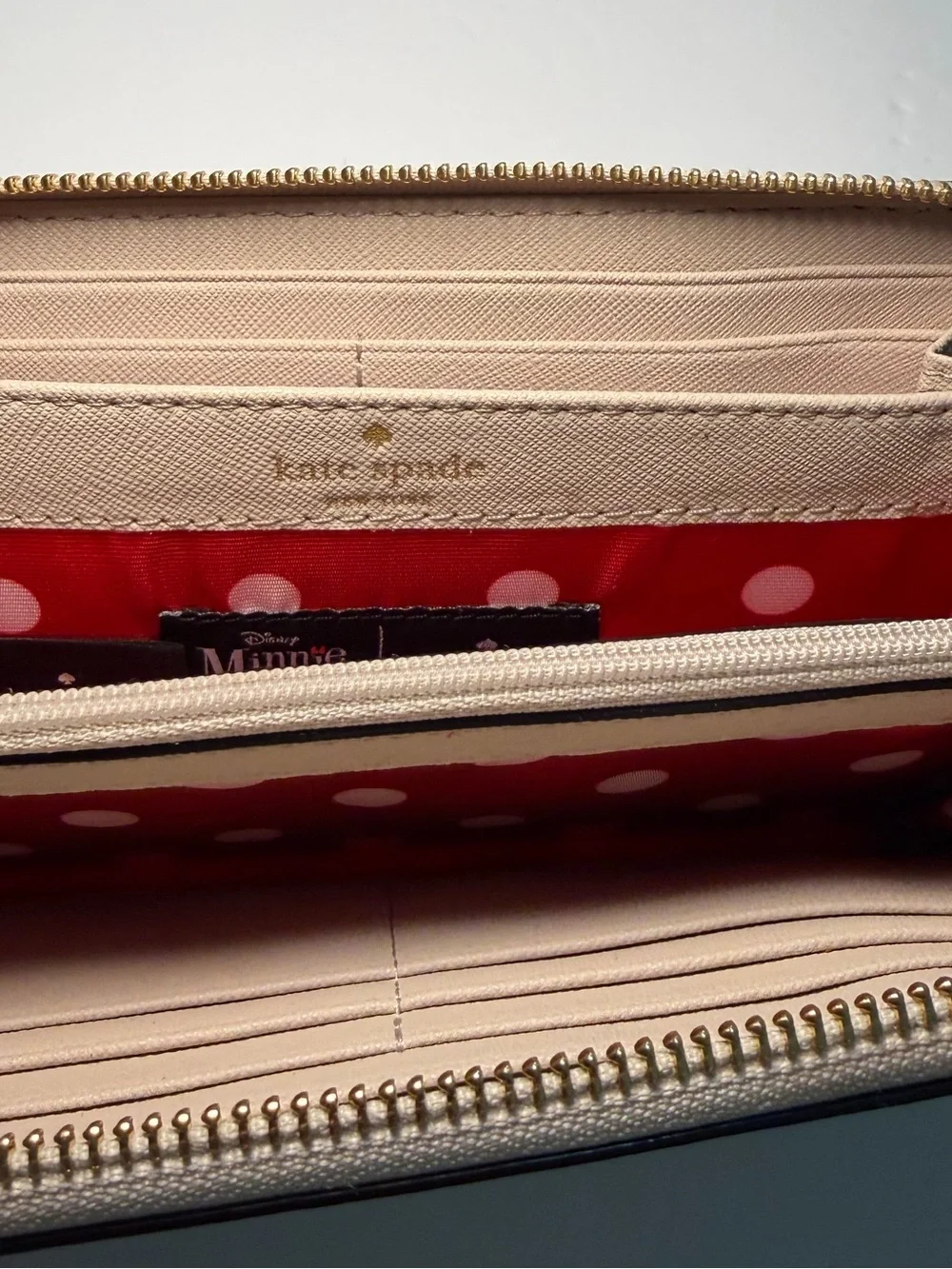 kate spade beige Minnie Mouse zip-around wallet